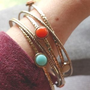 Set of 5 gold tone bangles